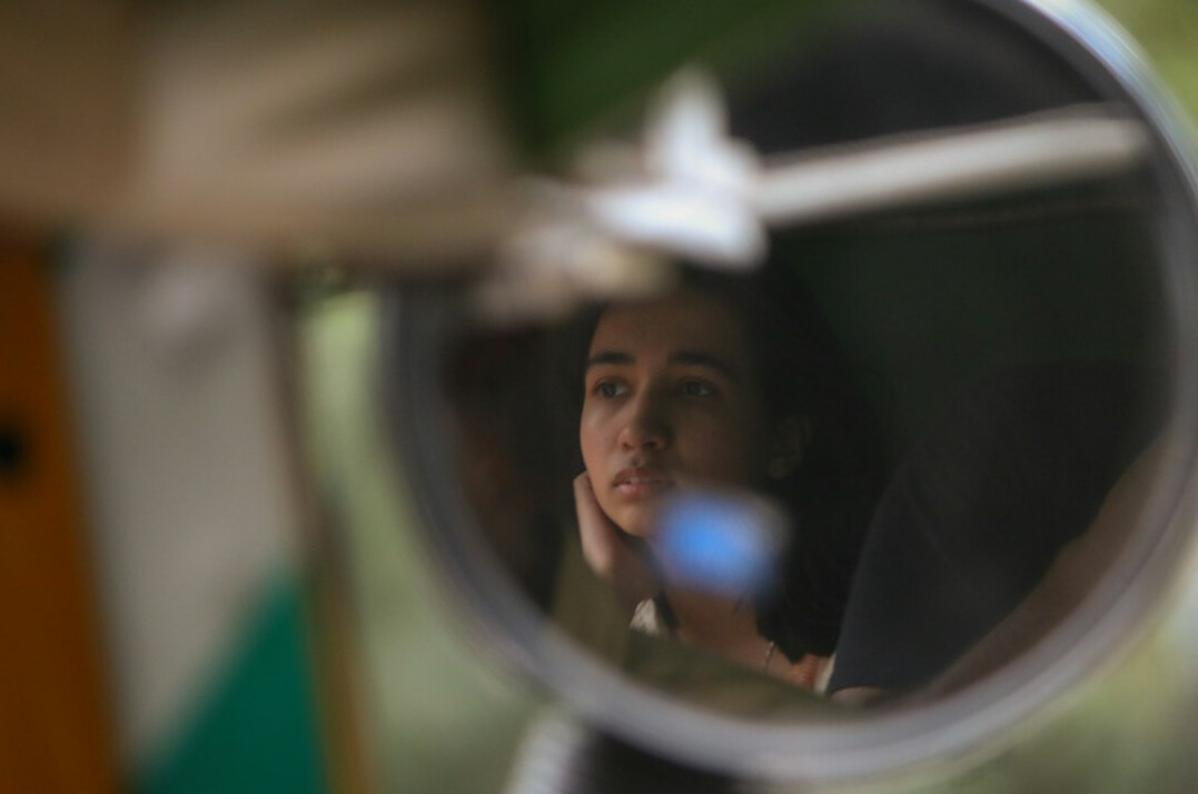 woman practicing speech in mirror