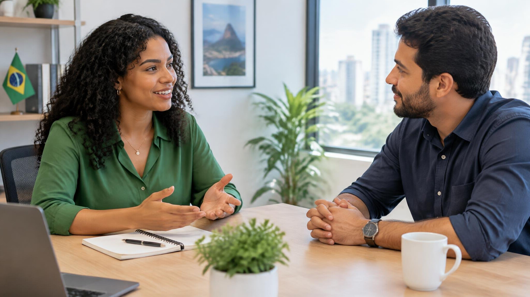 Two people calmly resolving a disagreement at a table