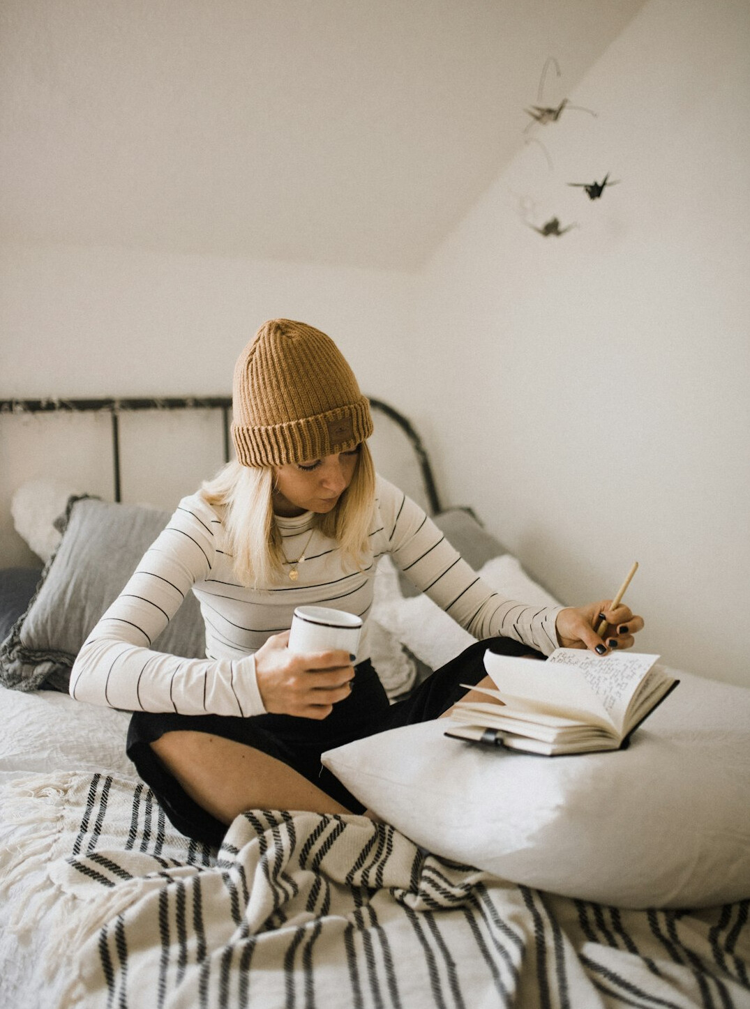 woman writing in journal